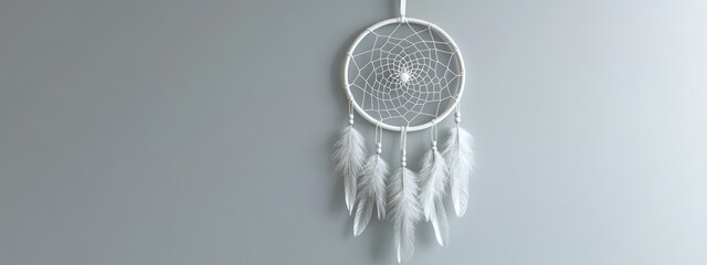 Obraz premium 3D rendering of a white dreamcatcher against a gray background for interior decoration