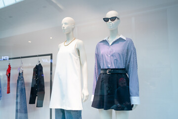 Mannequins Dressed In Female Woman Casual Clothes In Store Of Shopping Center. High quality photo