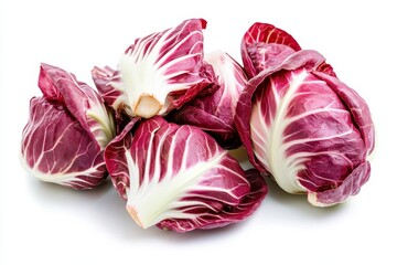 Obraz premium A cluster of red cabbage leaves arranged on a white background.