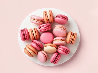 Obraz premium Colorful macarons arranged beautifully on a white plate with a soft pink background during a bright afternoon