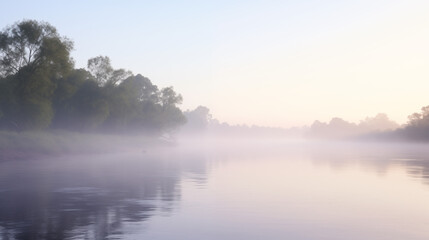 Fototapeta premium Misty Morning River Scene with Trees Lining the Banks at Dawn