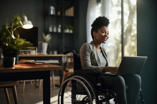 Female with a disability wheelchair computer sitting.