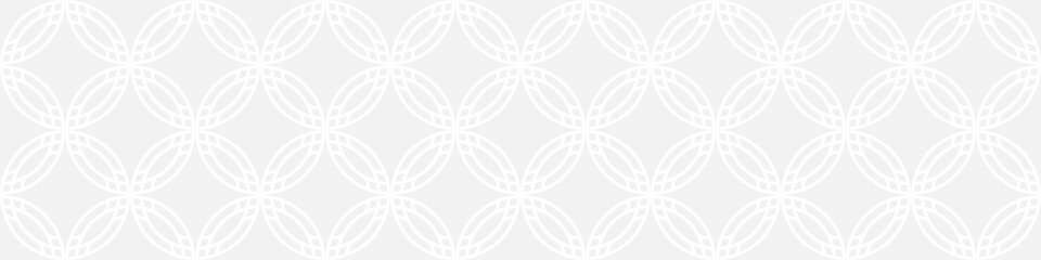 Seamless trendy pattern of stripes and diamonds, geometric white shapes for textiles and wallpaper. Abstract panoramic pattern on a gray background for a New Year or wedding cover or card.