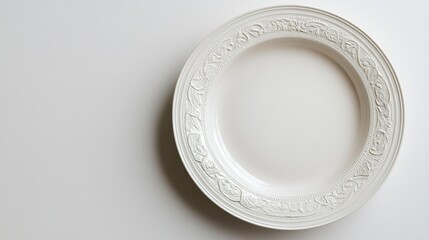 Elegant White Ornate Plate on Plain Background
