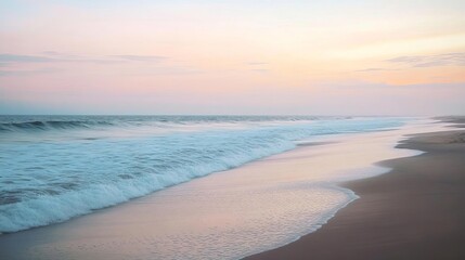 Obraz premium A quiet beach at dawn with gentle waves and a soft, pastel sky Morning Monday, Serene Coastline
