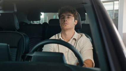 Caucasian business man driver male guy open door of new modern electric car sitting inside...