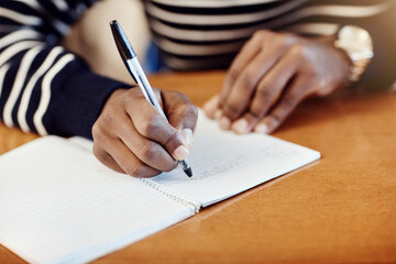 Student, exam and hands in class for education notebook, knowledge or test preparation in college....