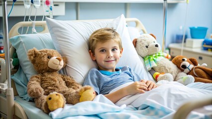 A young boy lying in a hospital bed, surrounded by stuffed animals and toys, with an IV pole and medical equipment in the background.