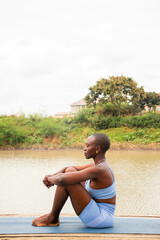Yoga stretch and meditation outdoors in the countryside