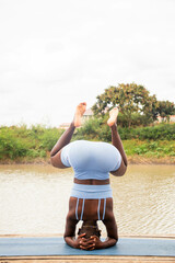Yoga stretch and meditation outdoors in the countryside