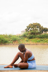 Yoga stretch and meditation outdoors in the countryside