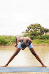 Yoga stretch and meditation outdoors in the countryside