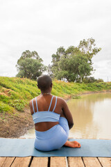 Yoga stretch and meditation outdoors in the countryside