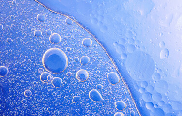 Bubbles on blue background. Abstract oxygen bubble water in sea sponge on blue background.Blue...