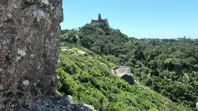 The sublime pena castle seen from the ruins of castelo dos mouros 