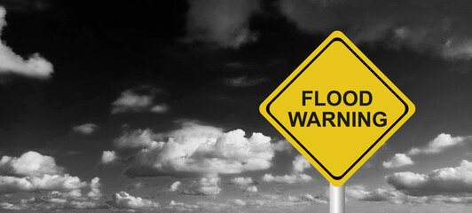 Hurricane season with symbol sign against a stormy background and copy space. dirty and angled sign adds to the drama. hurricane sign, hurricane season sing on cloudy background