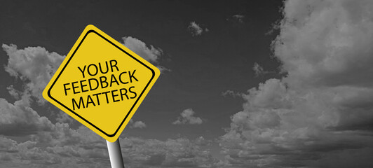 Top view image white paper card written text your feedback matters with a pen.