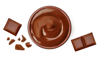 Melted dark chocolate in a bowl and broken chocolate bar pieces isolated on white background. Chocolate spread top view. Flat lay.