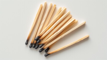 Obraz premium Burnt matches on a white background, isolated