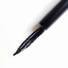 Closeup of a Black Marker on a Crisp White Background