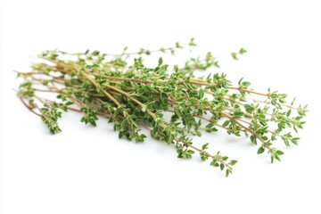 Fresh thyme sprigs arranged on a white background, showcasing their vibrant green leaves.