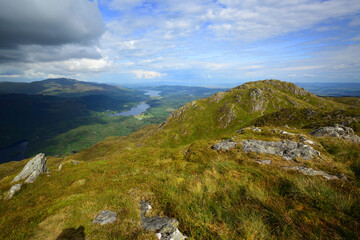 Obraz premium View east from the summit of Ben Venue, in The Trossachs are of Scotland (Loch Katrine, Loch Achray and Lock Venachar are visible)