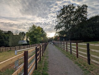 Fototapeta premium Farm sunset UK working life Evening Summer UK Europe.