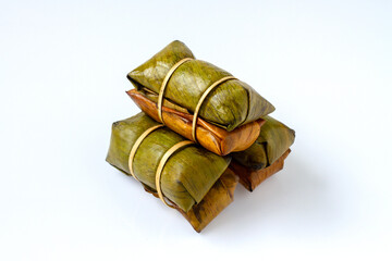Thai dessert, Sweet sticky rice with topping inside banana, bean or taro, In Thai name is Khao Tom...