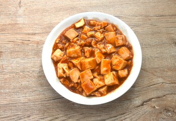 fried slice soft tofu with chop pork in soybean sauce Chinese food on plate