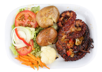 Grilled octopus with potatoes and vegetables isolated