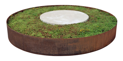 Rusty round iron flower bed with green  grass isolated