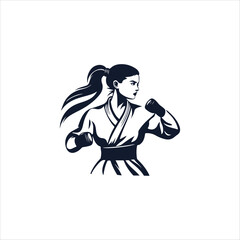 Fototapeta premium Karate inscription and silhouettes of two athletes kicking