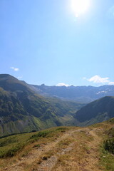 Hiking trail in Cirque de Troumouse - glacial cirque located in the center of the Pyrenees chain, in the Hautes-Pyrénées department in France, forming the border with Spain to the south.