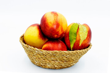 Nectarines are a sweet fruit, similar to peaches, except they grow without fuzz on their skin.