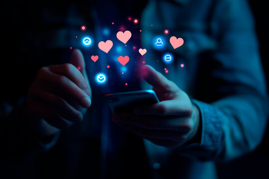 
Social media and digital online communication concept, man using smartphone with likes icons on social media. Banner background