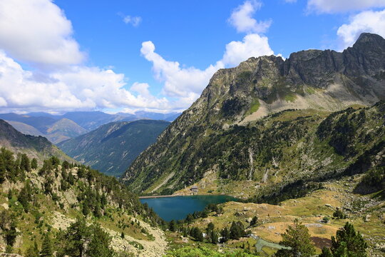 View of Era Restanca glacial lake before the last descent stretch to Restanca refuge on GR11 long-distance hiking trail, Aiguestortes & Estany de Sant Maurici National Park