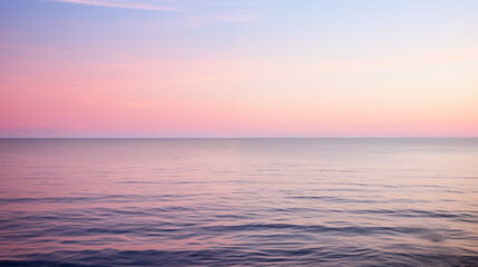 Vibrant Twilight Over Still Ocean With Reflective Waters and Gradient Sky