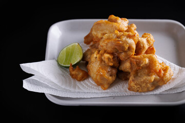 Chicken Karaage Japanese Fried chicken isolated in black background