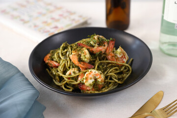 ispaghetti with pesto and shrimp Vegetarian vegetable low carb pasta.Italian food .Traditional Italian cuisine.