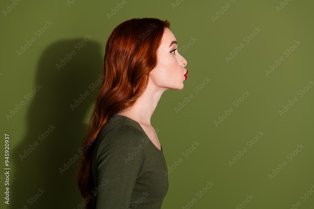 Canvas Prints photo of adorable pretty lady wear shirt kissing empty space isolated khaki color background