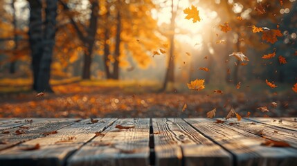 Autumn background. Wooden empty boards table against the backdrop of an autumn park with colorful falling leaves, beautiful bokeh with sunset lighting