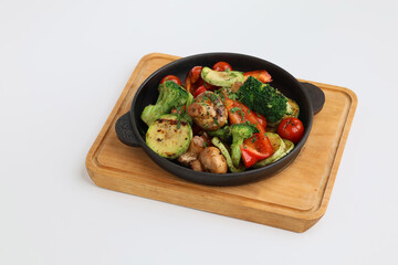 Grilled colorful vegetable : bell pepper, zucchini, eggplant , broccoli on a pan on white background background.