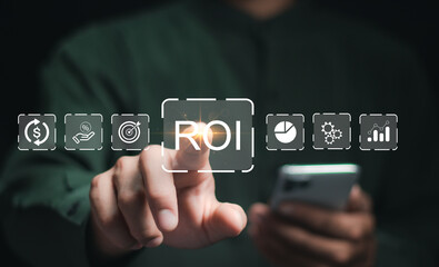 Analyzing Return on Investment (ROI) and various financial icons, representing the analysis of...