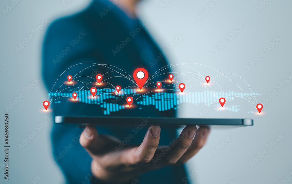 Aufkleber Businessman holding virtual world map with location icon and connection line for business technology global network concept.