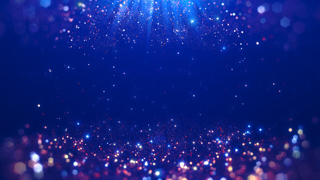 Bright dark blue abstract background with sparkling bokeh effect and light particles of different sizes and colors.