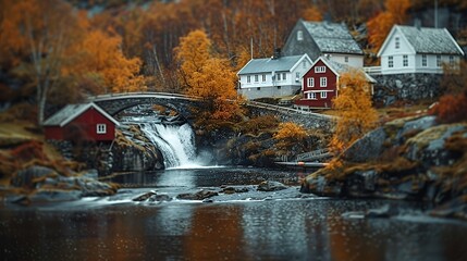 A serene autumn landscape featuring a quaint bridge, waterfall, and charming houses.