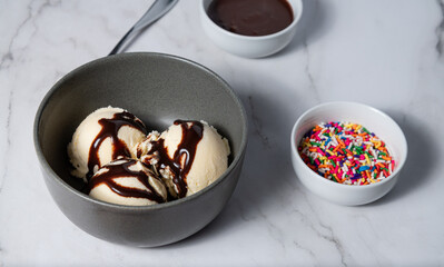Vanilla Ice Cream in Bowl on Marble Countertop