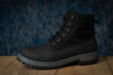 Men's black boot. Stylish winter shoe