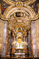 Beautiful chapel with marble decoration, cross and golden ostensory in Ravenna