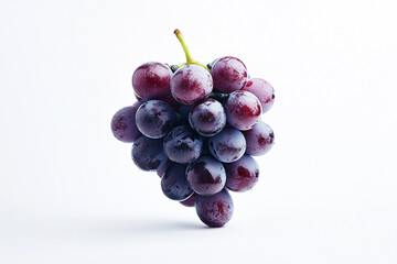 Fototapeta premium The photograph showcases a lush bunch of grapes, perfectly arranged against a clean, stark white background. The focused lighting highlights the grapes' round, plump shape, emphasizing their natural